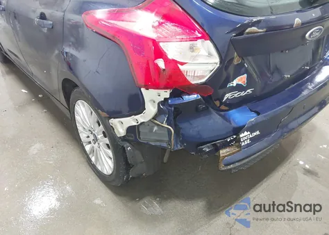 2012 Ford Focus Titanium z USA, uszkodzony, nr VIN 1FAHP3N24CL155766